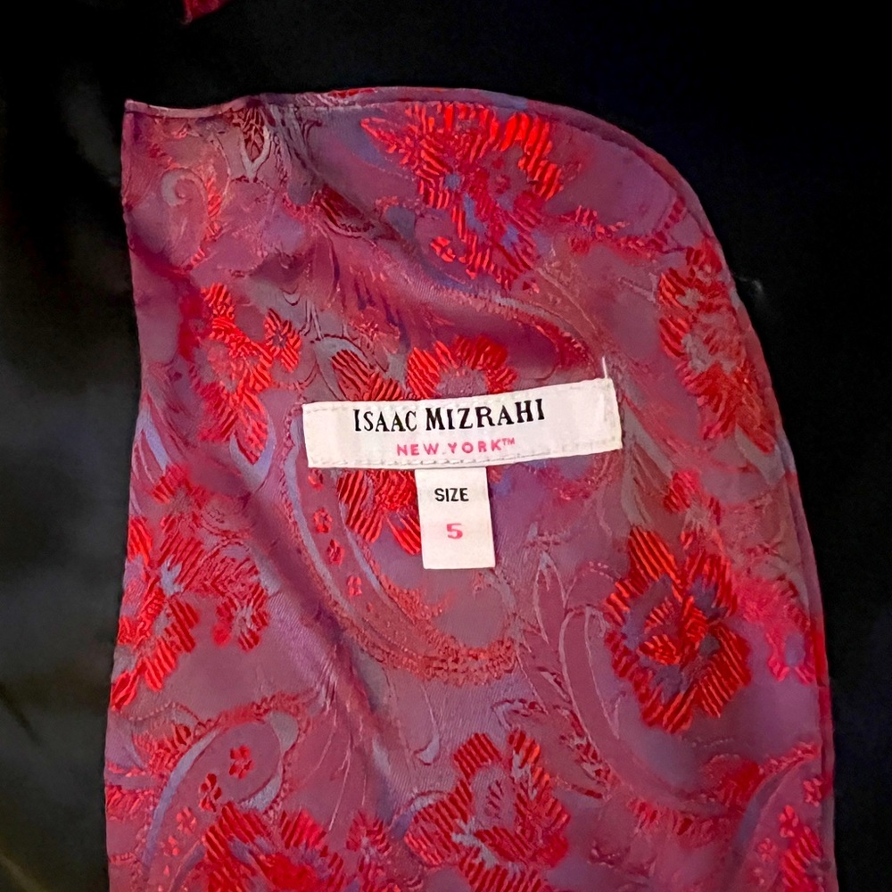 two piece suit purchased for family wedding never worn. Added the pocket square